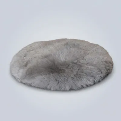 Productafbeelding van Kunststof vacht tapijt, rond, 90 cm diameter. Zacht, met lange pool. Grijs