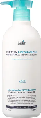 A white bottle of Lador Keratin LPP Shampoo with a teal pump dispenser.