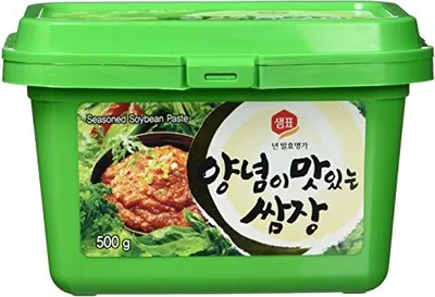 A green tub of Sempio Ssamjang (seasoned soybean paste) is shown against a white background.
