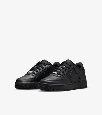 A pair of black Nike Air Force 1 sneakers are shown from a slightly elevated side angle against a white background.