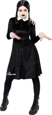 A woman dressed as Wednesday Addams from The Addams Family.