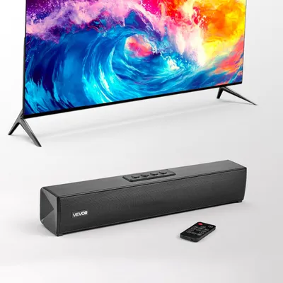A television and a soundbar are displayed on a white surface.