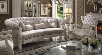 Immagine prodotto di Divano angolare grande, imbottito, composto da 4 posti più 1, rivestito in tessuto. Modello Chesterfield