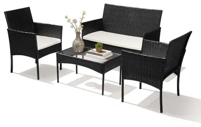 Immagine prodotto di Set da giardino in rattan sintetico Vigevee, composto da 4 elementi: divano, 2 sedie, tavolino in vetro e cuscini per seduta, ideale per balcone o terrazza, colore nero