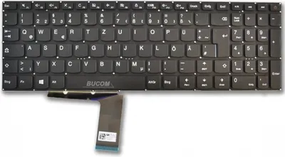 A black keyboard with a ribbon cable attached.
