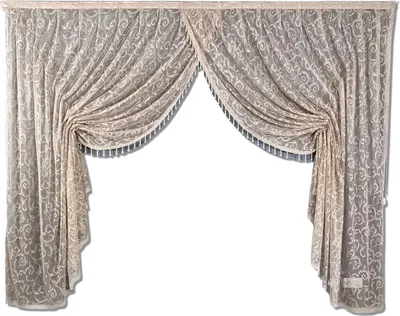 A pair of beige lace curtains with a decorative pattern, draped and tied back.