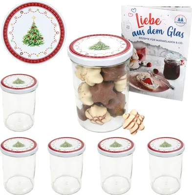A set of glass jars with lids, some filled with cookies, and a recipe booklet.