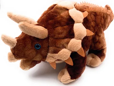 A plush toy dinosaur on a white background.