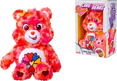 A plush toy bear and its packaging are shown side-by-side against a white background.