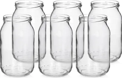 A group of empty glass jars arranged on a white background.
