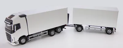 Zdjęcie produktu dla Emek 89732 Volvo FH z podnośnikiem i przyczepą białe