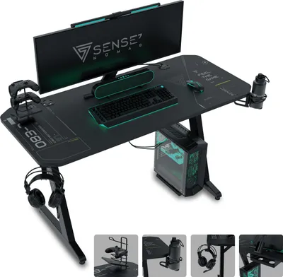 A gaming desk setup with a computer, monitor, keyboard, and accessories.