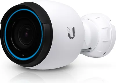 A white security camera with a black lens housing and a blue ring around the lens.