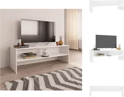A white TV stand with a television and decorative items on it, placed in a room with a rug.