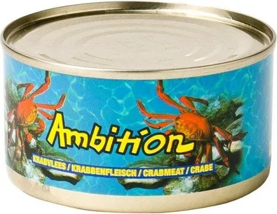 A close-up of a tin can with a label depicting crabs and water.