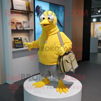 Obrázek produktu pro Postava REDBROKOLY maskota Lemon Yellow Racek oblečená do mikiny a kufříků