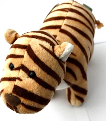 A plush toy tiger is shown from a slightly elevated angle against a white background.