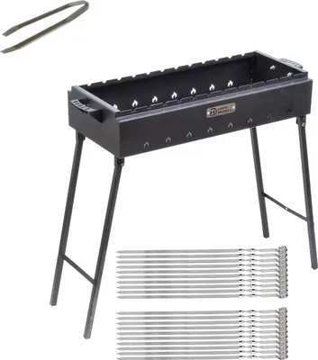 A black charcoal grill with foldable legs, tongs, and skewers on a white background.