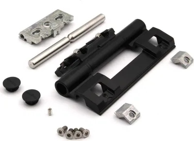 A collection of hardware components, including a black metal bolt assembly and various metal and plastic fittings, laid out on a white background.