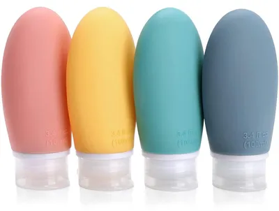 Productafbeelding van Reisflessen set, 4 stuks, 100 ml, siliconen, lekvrij, navulbaar, BPA-vrij, TSA-gecertificeerd, blauw, cyaan, roze, geel