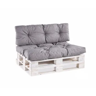 A grey pallet sofa cushion set on a white wooden pallet base, isolated on a white background.