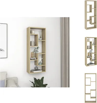 A wall-mounted shelf unit is displayed on a white wall, with a sofa and a plant visible in the foreground. The shelf unit is filled with decorative items.