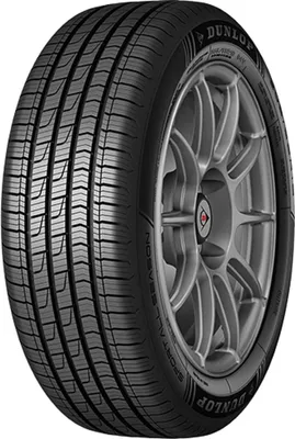 A close-up studio shot of a Dunlop Sport All Season tire mounted on a silver alloy wheel, presented against a white background.