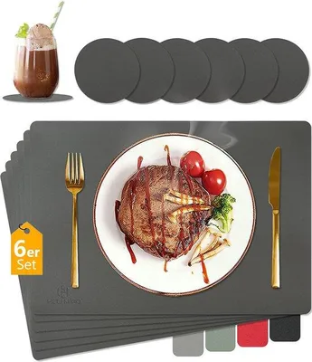 Immagine prodotto di Sottopiatti lavabili Unyqoos® realizzati in ecopelle in PVC, reversibili, resistenti al calore fino a 80°C, antiscivolo, set da 6 sottopiatti 43x30 cm + 6 sottobicchieri Ø10 cm, color grigio scuro