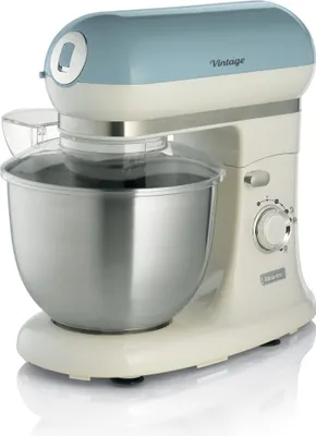 A vintage-style kitchen mixer with a cream-colored base and a light blue top.