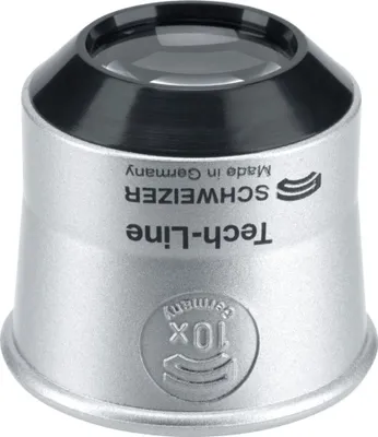 A close-up studio shot of a jeweler's loupe.