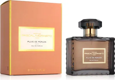 A product shot of a perfume bottle and its box, presented side-by-side against a white background.