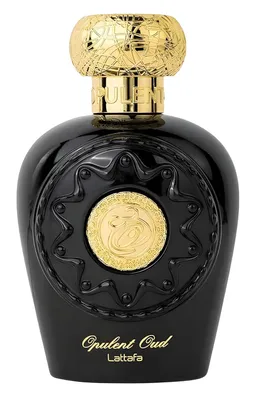 A black perfume bottle with gold accents and a gold cap, set against a white background.