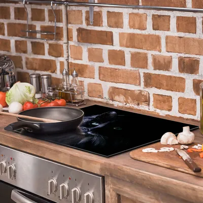 Imagen del producto de Placa de vidrio protectora para cocina, dimensiones 60x52 cm, marca Cat