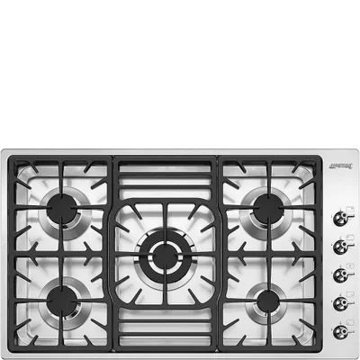 A top-down view of a stainless steel gas stovetop with black grates and burners.