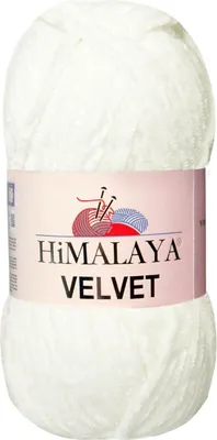 A ball of white yarn with a pink label.