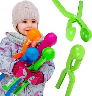 A child holding several colorful snowball makers.