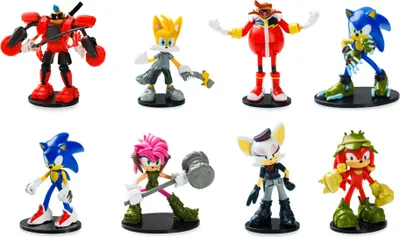 A collection of eight small action figures from the Sonic the Hedgehog franchise, arranged in two rows of four.