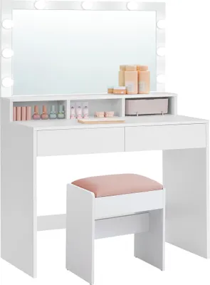 A white vanity table with a large illuminated mirror and a pink stool.