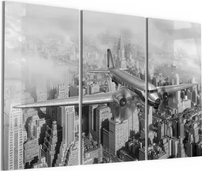 Produktbild von DEQORI Glasbild Echtglas 3x50x100 cm 'Flugzeug über Stadt' Wandbilder XXL groß