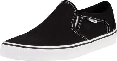 A black Vans slip-on shoe with white stitching and a white sole, shown from a side angle on a white background.