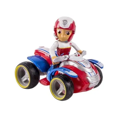 A toy Ryder figure riding a red and blue ATV.