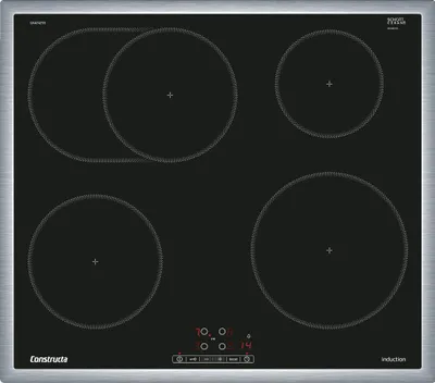 A top-down view of a black induction cooktop with four heating zones and a control panel.
