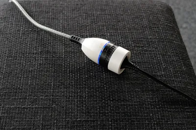 Produktbild von Textil-Verlängerungskabel mit beleuchtetem Ein/Aus-Drehschalter, Kabellänge:5 m, Kabelfarbe:schwarz/weiß