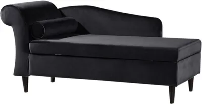 A black velvet chaise lounge with a bolster pillow is shown from a side view against a white background.