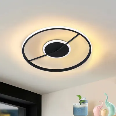A modern LED ceiling light fixture with a circular design, mounted on a white ceiling.