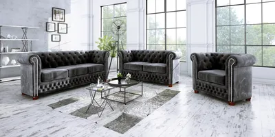 A living room setting with a Chesterfield sofa set.