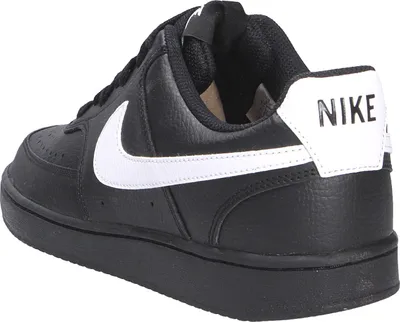 A black Nike sneaker with a white swoosh logo and white Nike text on the heel.