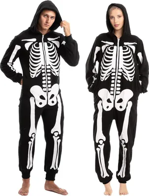 Two people wearing skeleton onesies.
