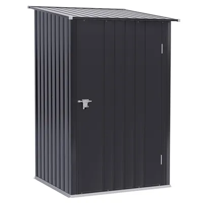 A dark gray metal storage shed with a sloped roof and a single door with a latch.