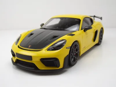 Produktbild von Minichamps 110062124 Porsche Cayman GT4 RS Weissach Package 2024 gelb 1:18